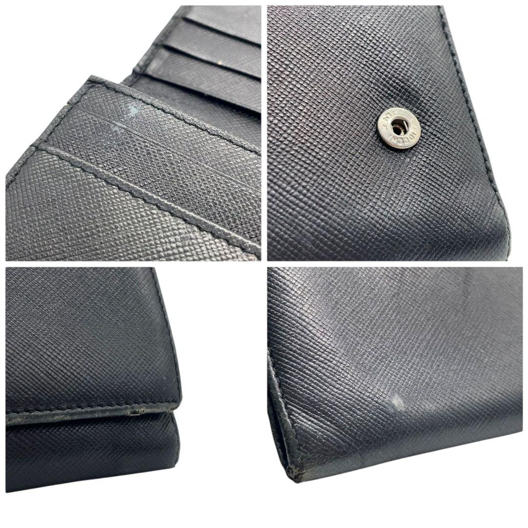 プラダ 長財布 黒 ブラック サフィアーノ レザー 本革 フラップ 三角ロゴプレート シルバー金具 ロゴ 高級感 シンプル 上品 PRADA W1