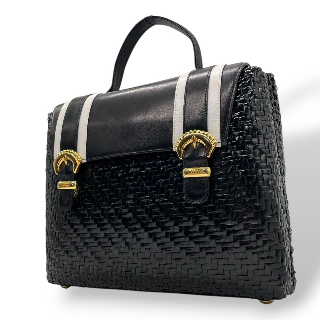 ロド ハンドバッグ 黒 白 編み込み カゴバッグ バイカラー トートバッグ レザー 本革 自立可 ゴールド金具 ロゴプレート RODO