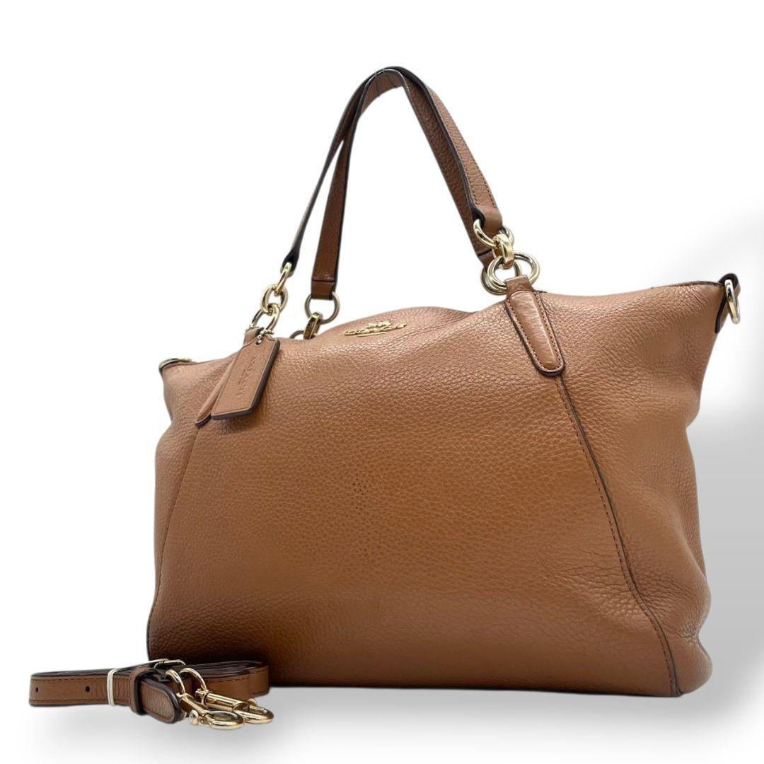 コーチ ハンドバッグ 茶 2way チェーン 斜め掛け可 レザー ロゴ s9 本革 ショルダーバッグ トートバッグ ブラウン ゴールド金具 ロゴタグ F28993