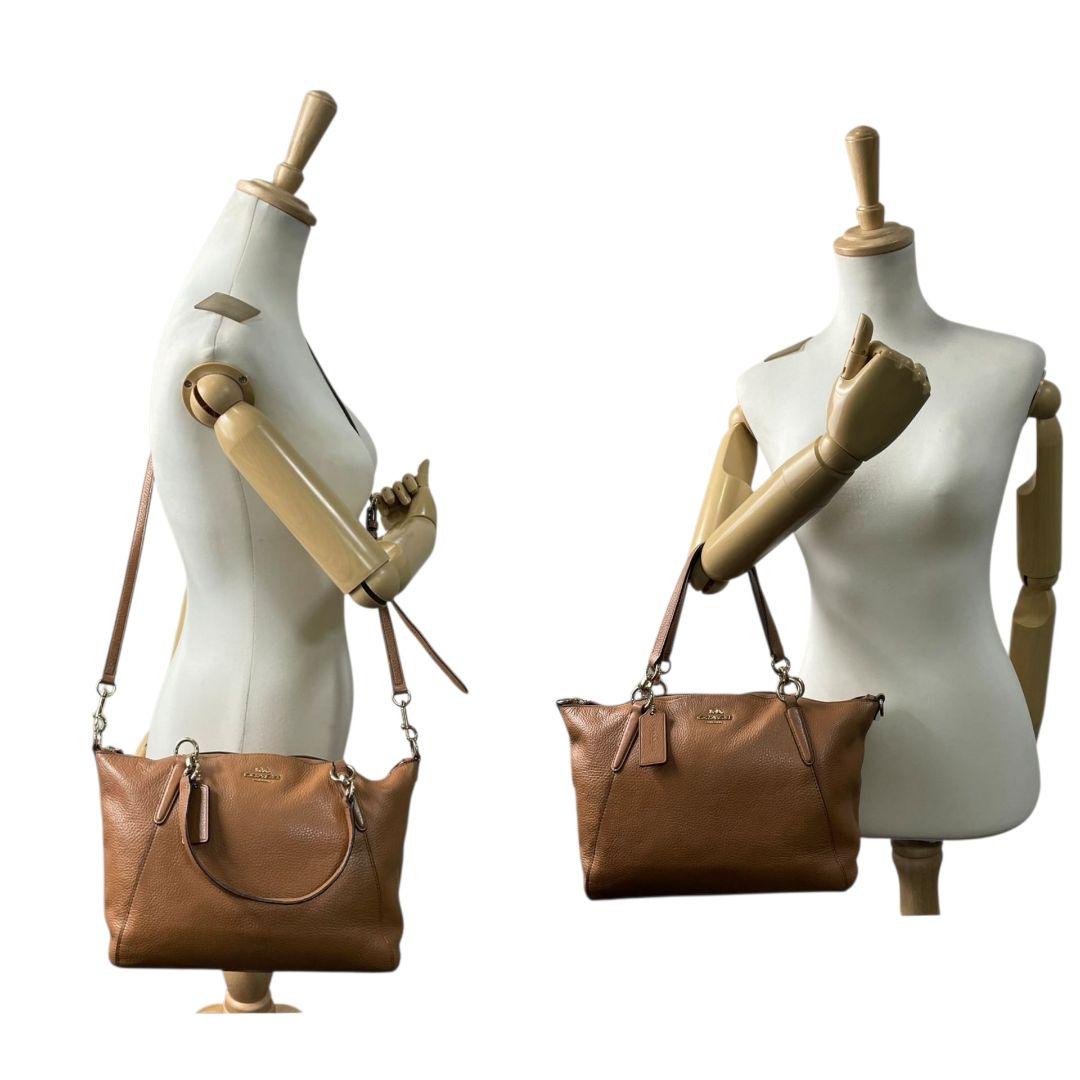 コーチ ハンドバッグ 茶 2way チェーン 斜め掛け可 レザー ロゴ s9 本革 ショルダーバッグ トートバッグ ブラウン ゴールド金具 ロゴタグ F28993