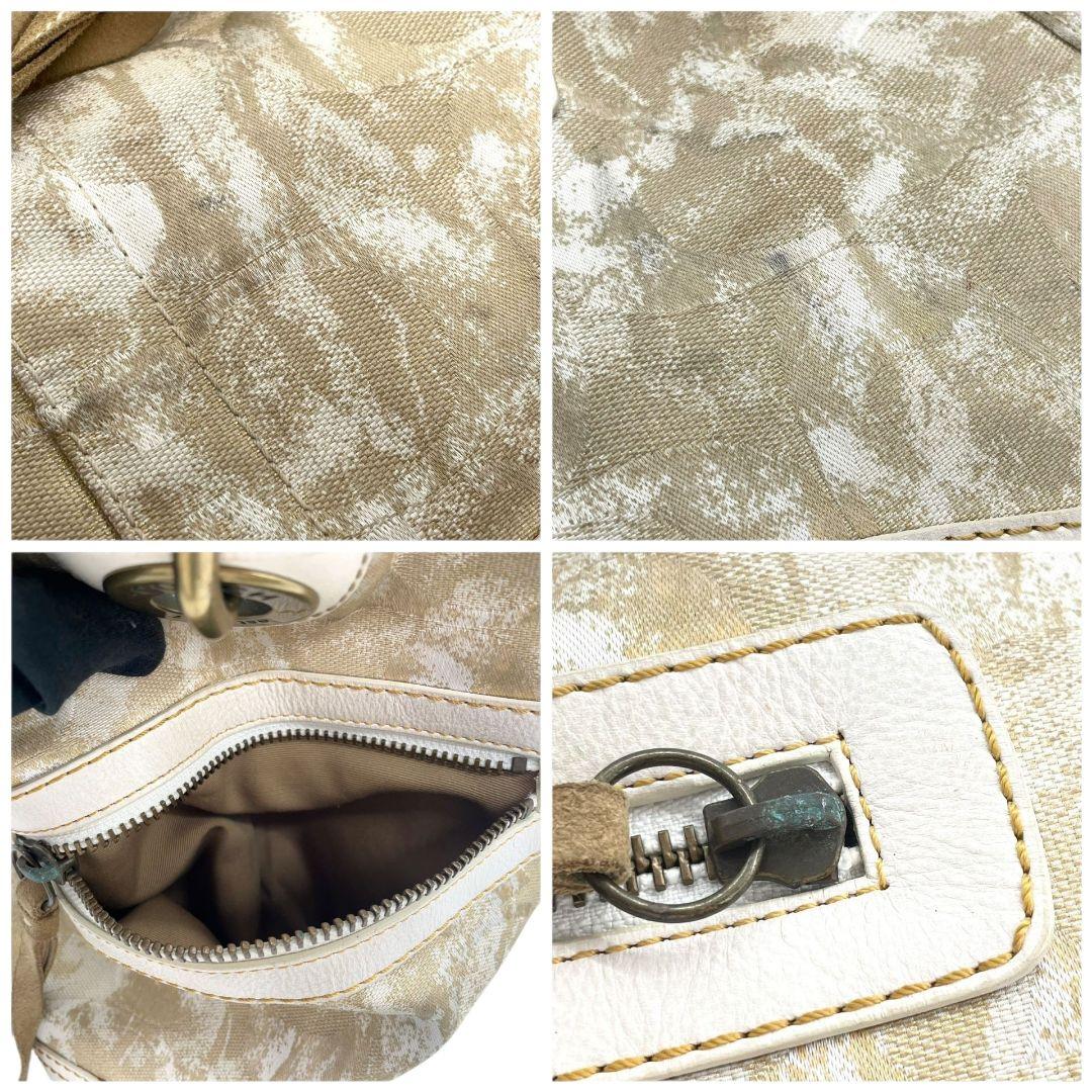 コーチ ハンドバッグ ベージュ シグネチャー ワンショルダー ホーボー s15 トートバッグ 肩掛け可 キャンバス レザー 本革 ゴールド金具 チャーム付き ロゴタグ 10010