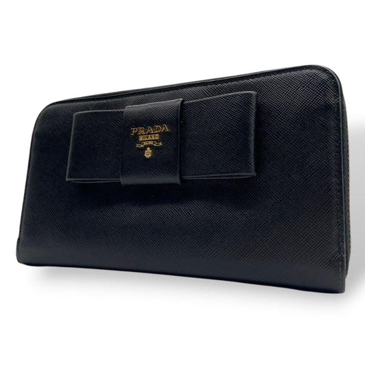 美品 プラダ 長財布 ブラック 黒 リボン サフィアーノ レザー 本革 ラウンドファスナー ラウンドジップ ゴールド金具 ロゴ PRADA W1