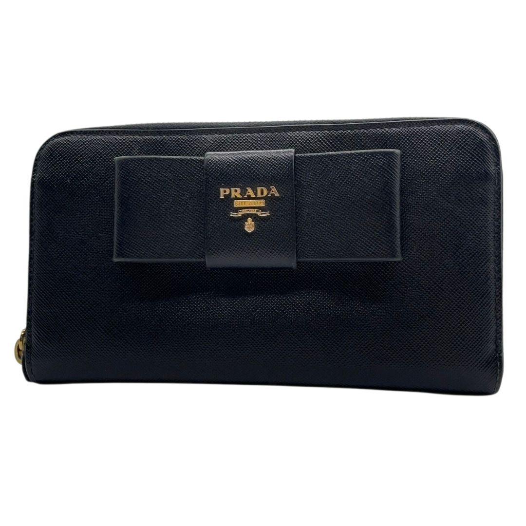 美品 プラダ 長財布 ブラック 黒 リボン サフィアーノ レザー 本革 ラウンドファスナー ラウンドジップ ゴールド金具 ロゴ PRADA W1