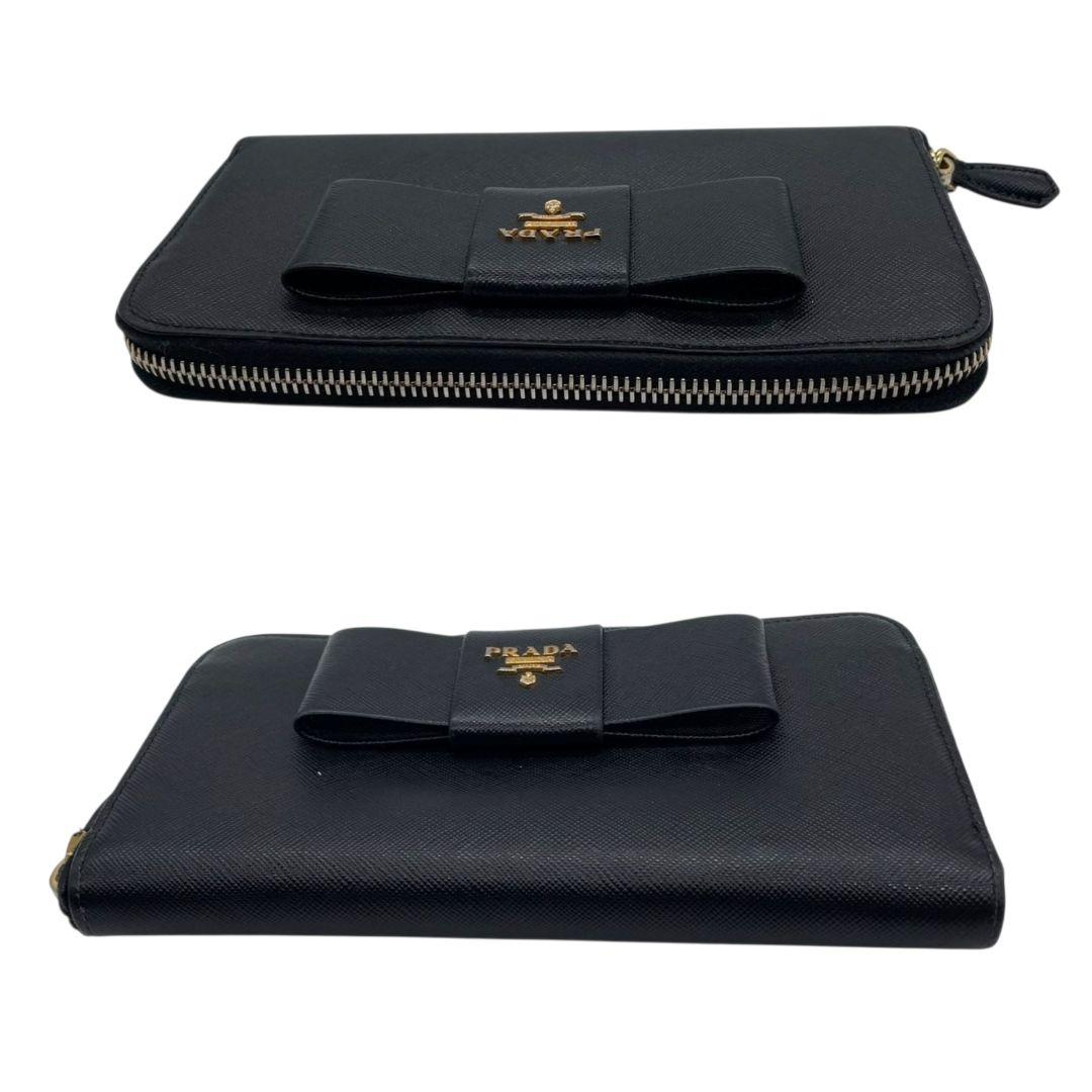 美品 プラダ 長財布 ブラック 黒 リボン サフィアーノ レザー 本革 ラウンドファスナー ラウンドジップ ゴールド金具 ロゴ PRADA W1