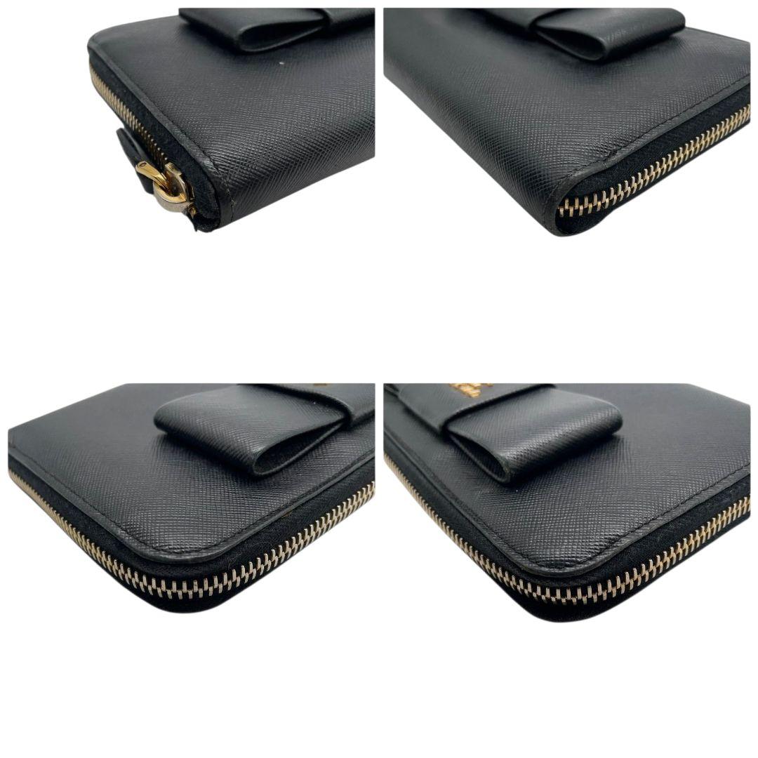 美品 プラダ 長財布 ブラック 黒 リボン サフィアーノ レザー 本革 ラウンドファスナー ラウンドジップ ゴールド金具 ロゴ PRADA W1